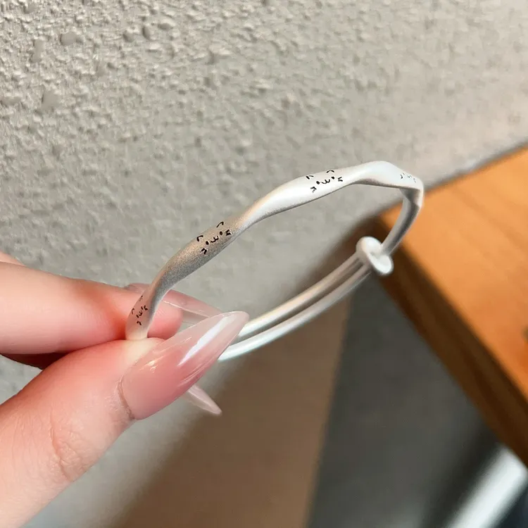 拾钰 足银手镯 足银999.9古法猫咪手镯时尚莫比乌斯实心推拉银镯