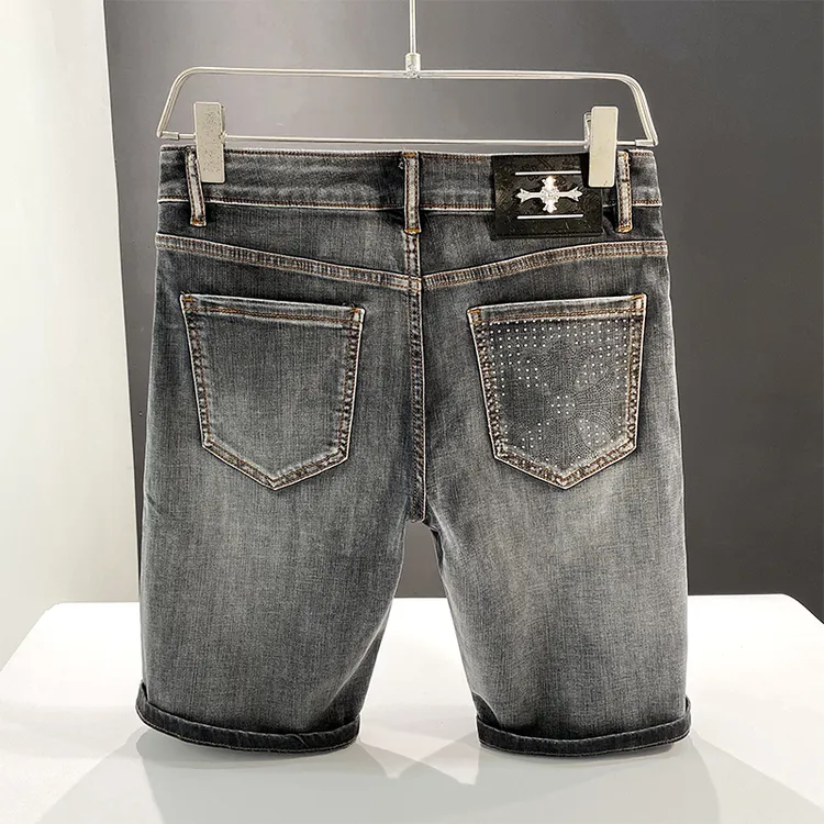约文库费高端时尚春夏季男款烟灰色牛仔短裤修身弹力时尚烫钻五分