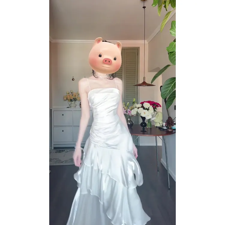 海边度假风蛋糕长裙2025夏季新款法式白色荷叶边缎面吊带连衣裙