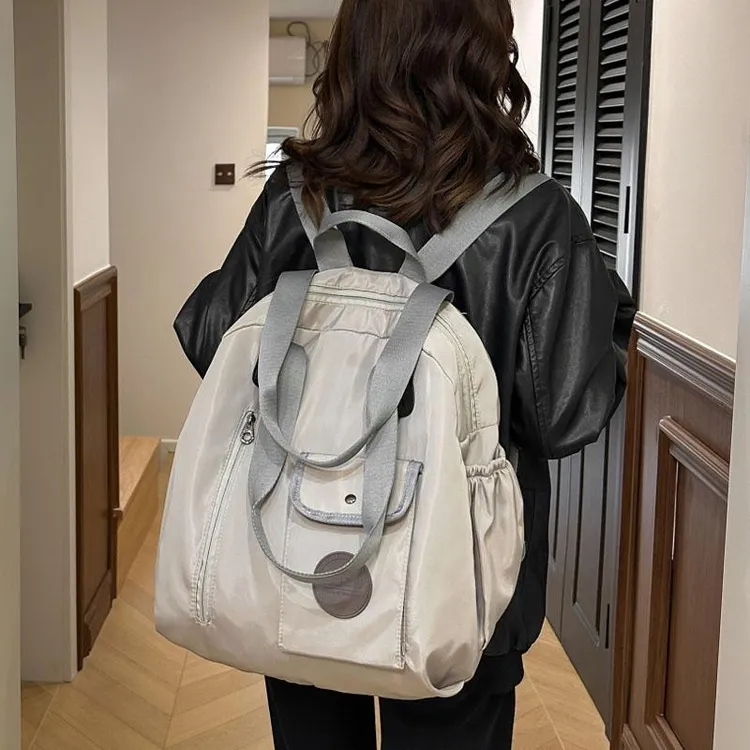 大容量双肩包休闲女士外出旅行包时尚斜挎单肩两用包多功能牛津布