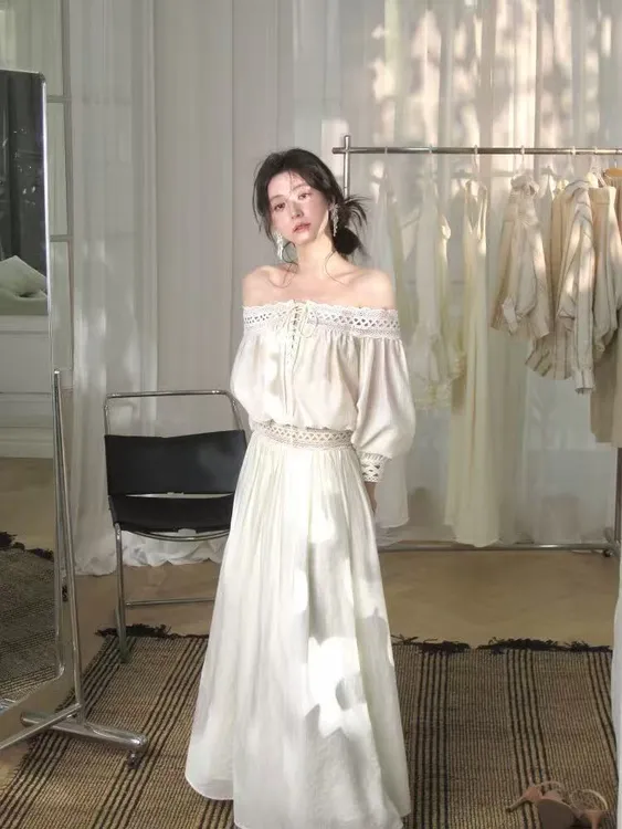 从一时刻浮生半日高级设计感镂空花边一字肩上衣a摆鱼尾套装