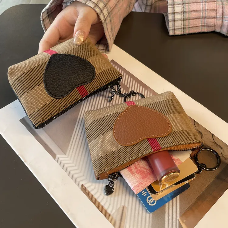 欧美时尚真皮零钱包女2025新款潮休闲迷你包格子硬币包帆布小钱包
