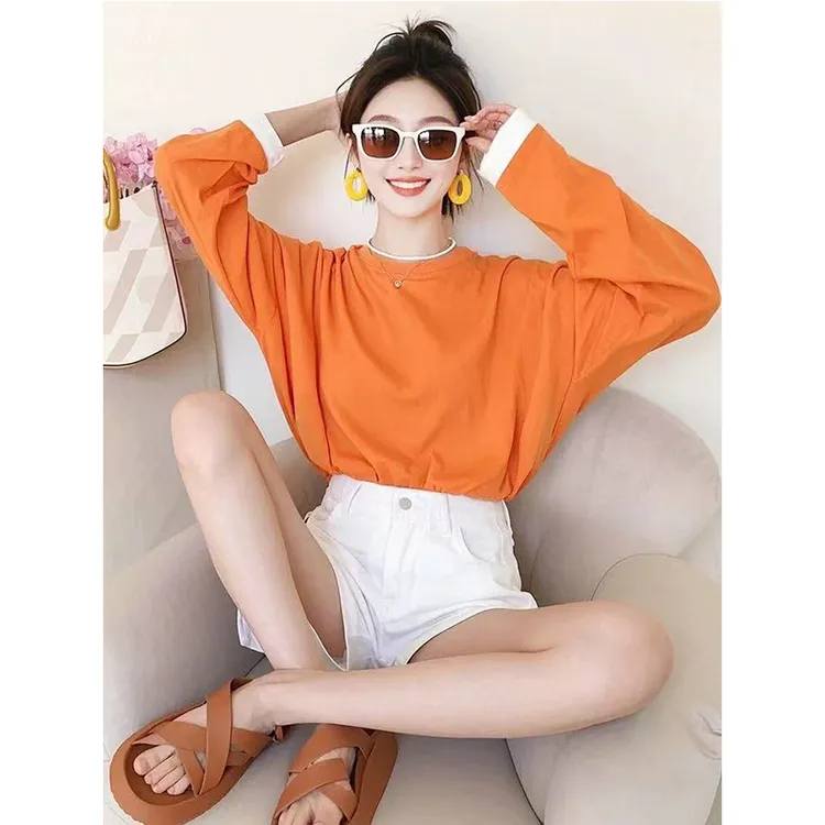 橘色长袖t恤2025春季装新时尚款宽松内搭打底衫上衣白色短裤套装