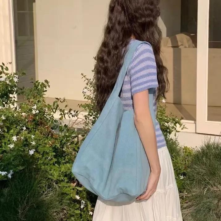 韩系大容量慵懒风简约百搭帆布包2025新款日常通勤单肩托特包包女