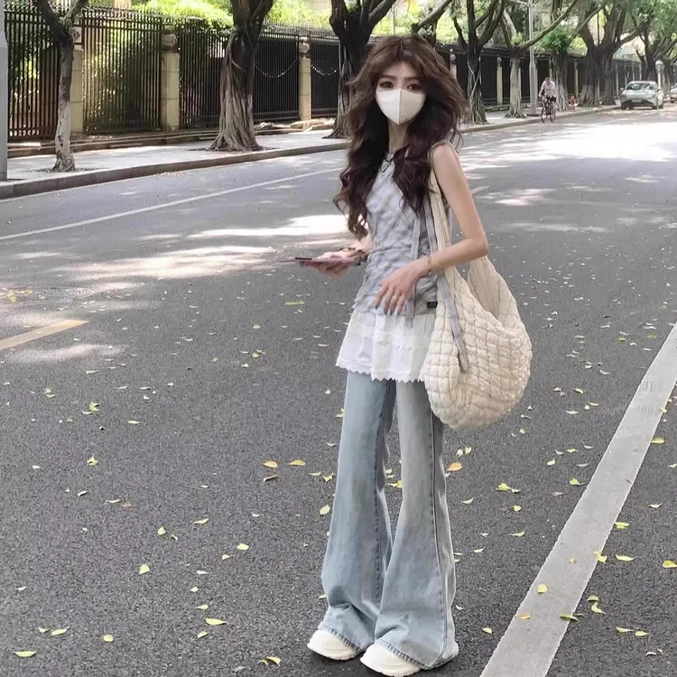 雪千羽浅蓝色微喇叭牛仔裤女2025年春夏季新款高腰显瘦弹力喇叭裤