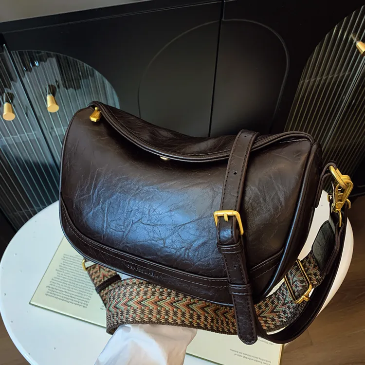 小众设计包包女2025新款春夏美拉德复古单肩腋下包百搭斜挎饺子包