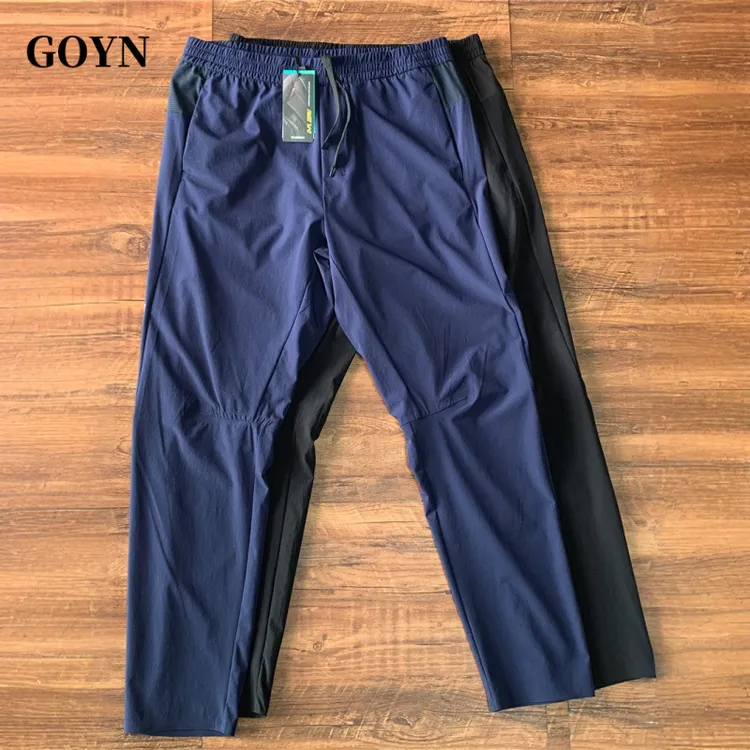 GOYN秋季轻奢薄款纯色男士修身弹力透气速干直筒男装简约休闲长裤