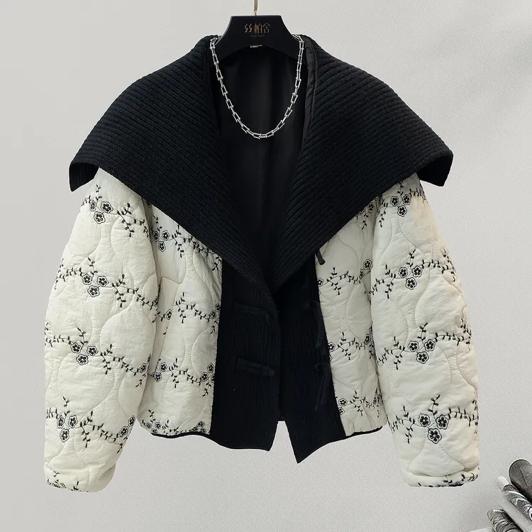 她池2025冬装新款女装设计感拼接宽松款插肩袖翻领棉服T54B8013HA