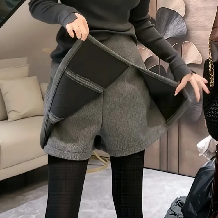 2025年秋冬新款A字毛呢短裙女大码显瘦高级感不规则百搭开叉裙裤