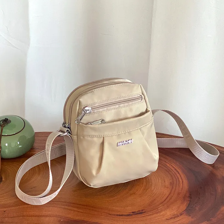 牛津布新款简约单肩包时尚小巧多层手机包尼龙防水斜挎百搭小包包