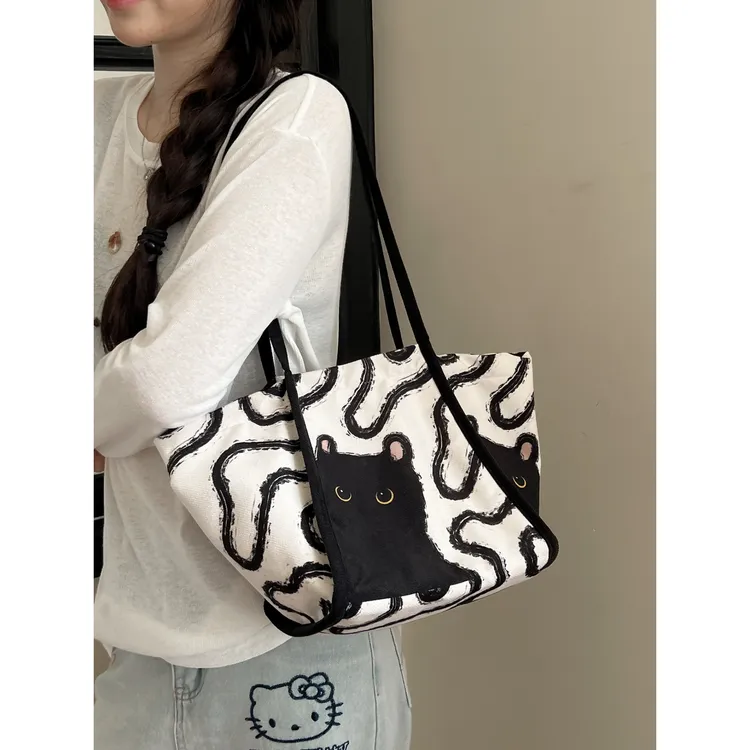 今年流行包包女小煤球元宝包2025新款复古时尚高极感小猫斜挎包