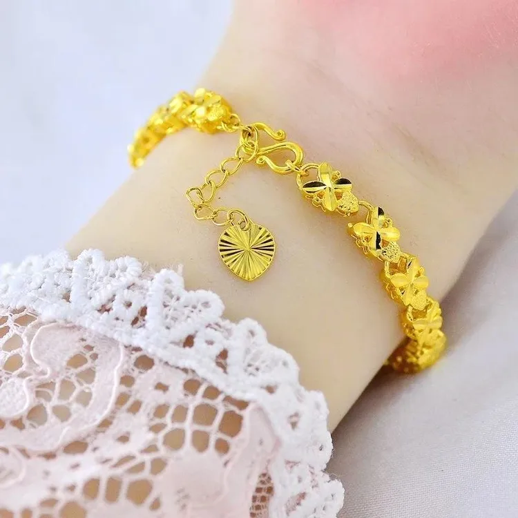 铜合金 金黄色四叶草花双面立体镂空时尚百搭女款 吸奶商品图