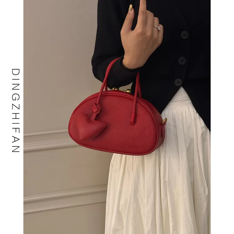 定制范 爱心红色保龄球包包女2025新款小众结婚手提斜挎包新娘包