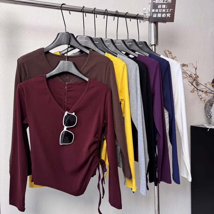 长袖辣妹不规则秋冬侧边抽绳收腰显瘦V领打底衫绵女装后背镂空T恤