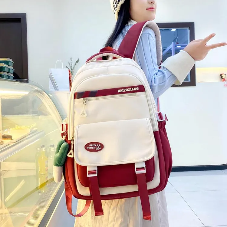 新款书包女韩版ins甜美风撞色拼接小学生三到六年级轻便双肩包