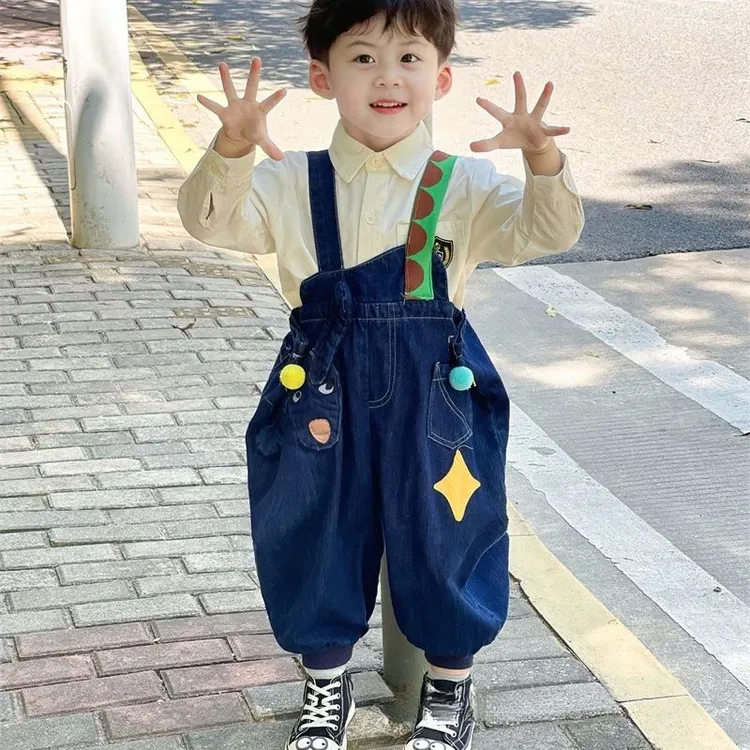 韩版儿童春秋小丑牛仔背带裤男女童可爱卡通重工宽松长裤潮款