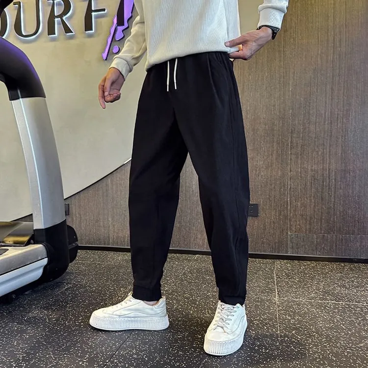 男士潮牌裤子痞帅流行的秋冬季男裤2025新款潮流爆款小直脚休闲裤
