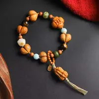 虎眼石原创设计纳福碳烧熊掌木雕流苏花生弹力手串