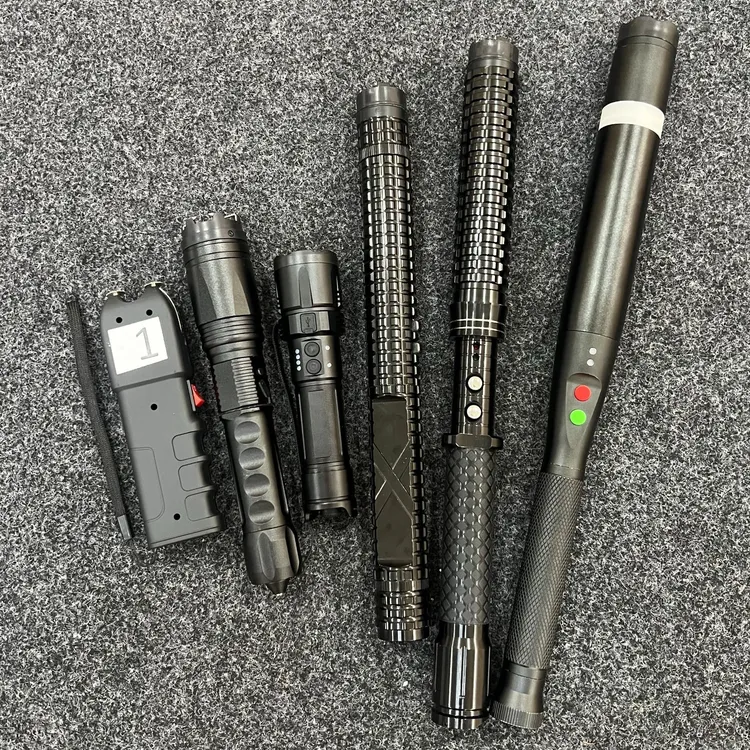 超亮远射手电筒防身专用高压防卫自救神器充电美版928防身手电