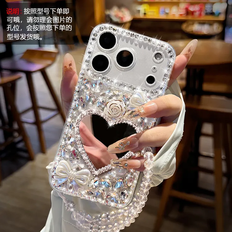 适用苹果14闪钻爱心镜子15plus全包16prox防摔17promax手绳2机壳3