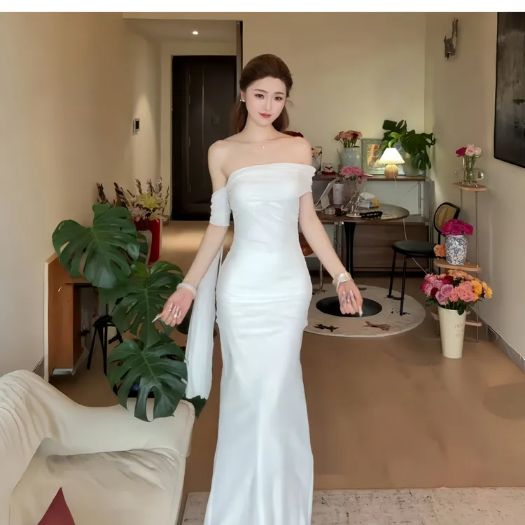 一字肩飘带白色连衣裙女夏季富家千金清冷感裙子女装收腰礼服长裙