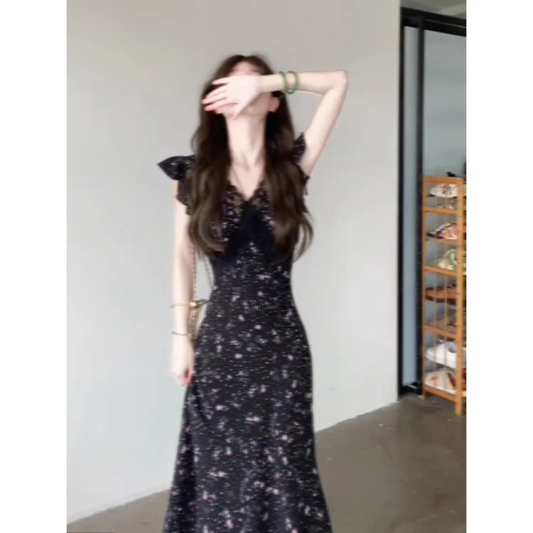 黑色蕾丝拼接碎花连衣裙海边度假风法式气质独特漂亮掐腰长裙夏季