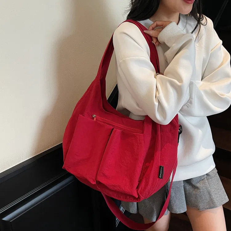 今年流行轻便防泼水牛津布通勤托特包大容量休闲旅行单肩斜挎包潮