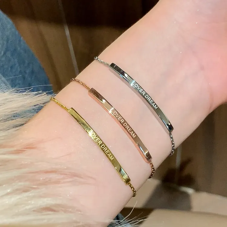 简约字母钛钢手链女生高级感不锈钢闺蜜手链手串批发手绳抽拉手饰