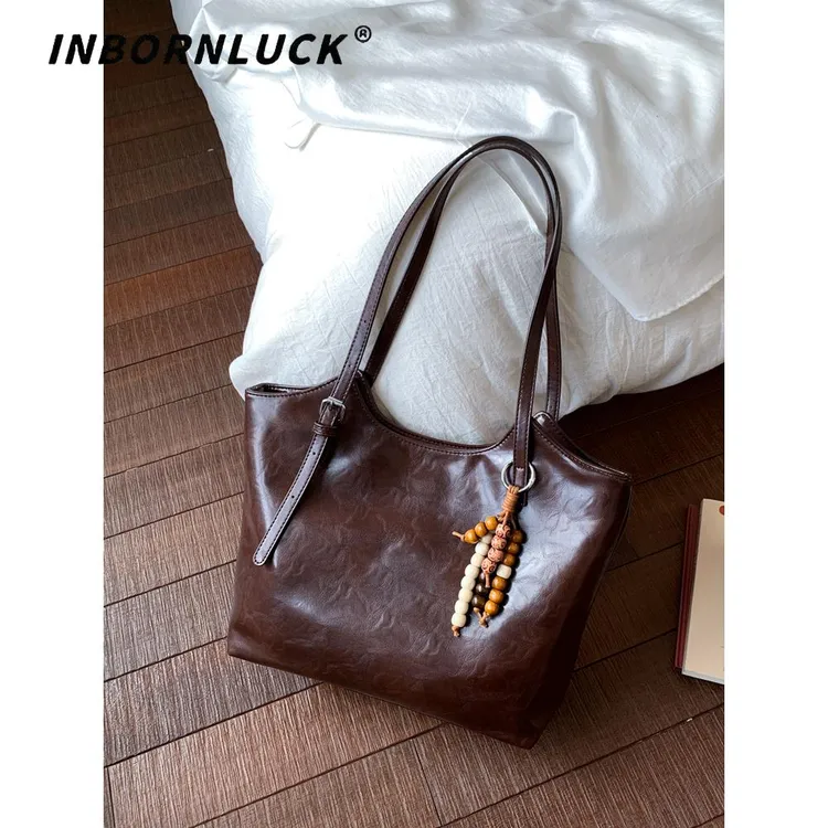 简约轻奢小众托特包女包2025新款覆古大容量通勤包休闲百搭单肩包