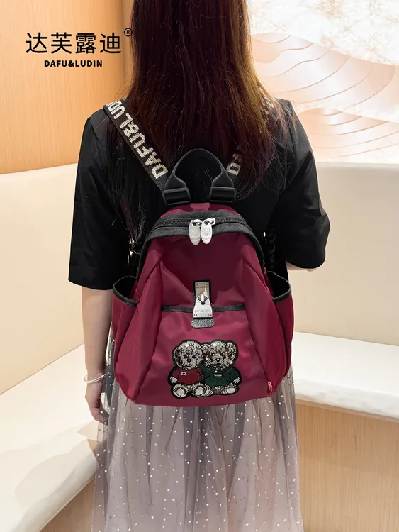 达芙露迪初秋新款烫钻双肩包大容量防水百搭透气女士单肩斜挎背包