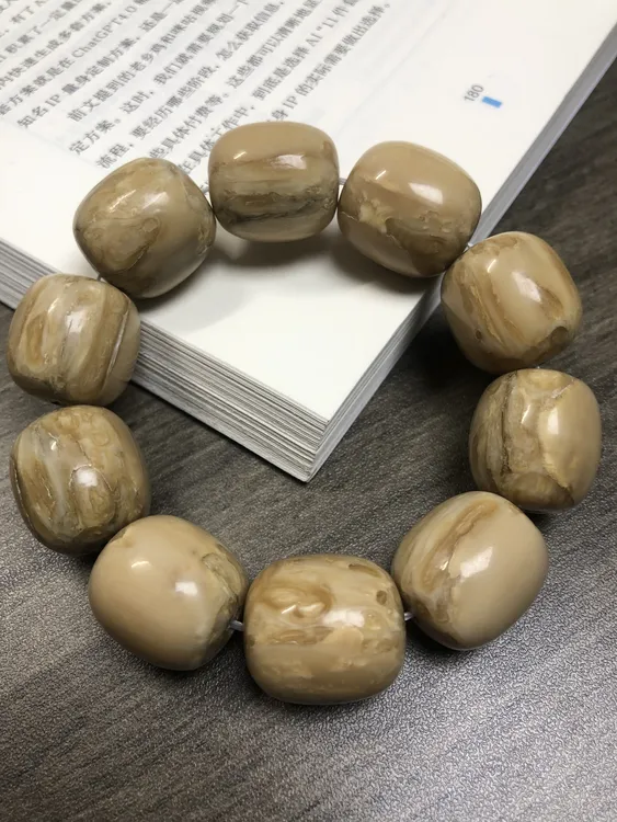 A04猛犸牙牙髓手串假一赔四猛犸手串