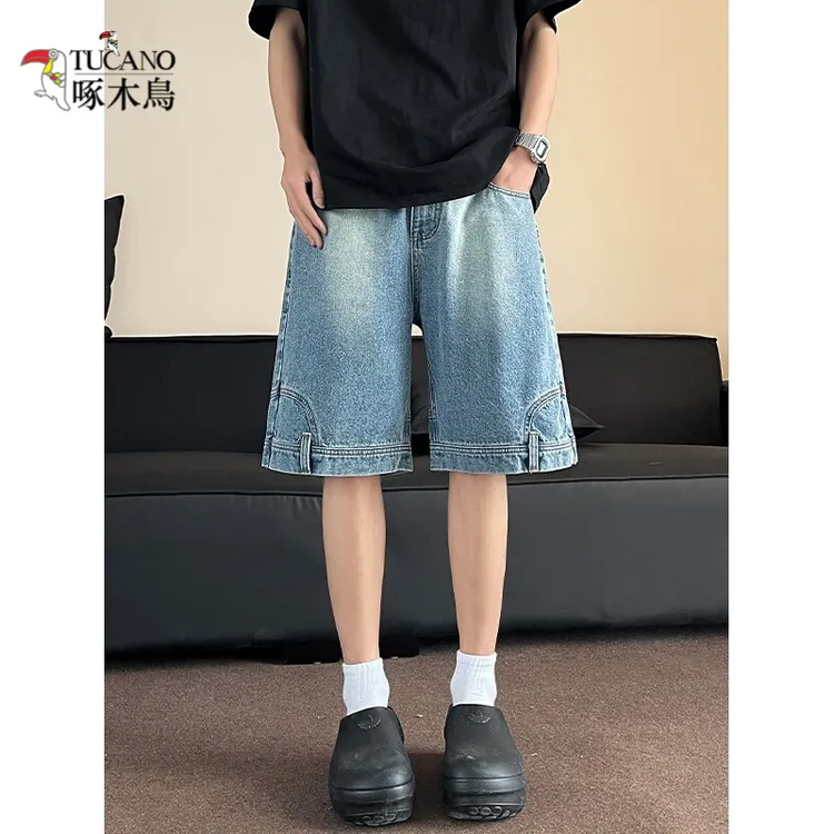 啄木鸟2025简约潮流口袋倒装贴标牛仔短裤男