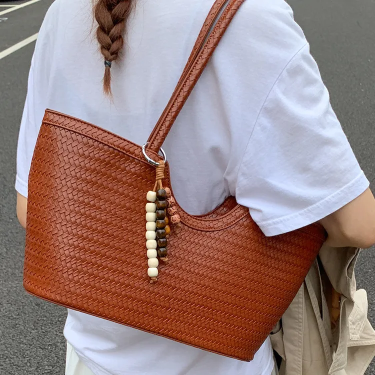 大容量通勤编织包包女式2025秋季新款高颜值菜篮子包时尚托特包女