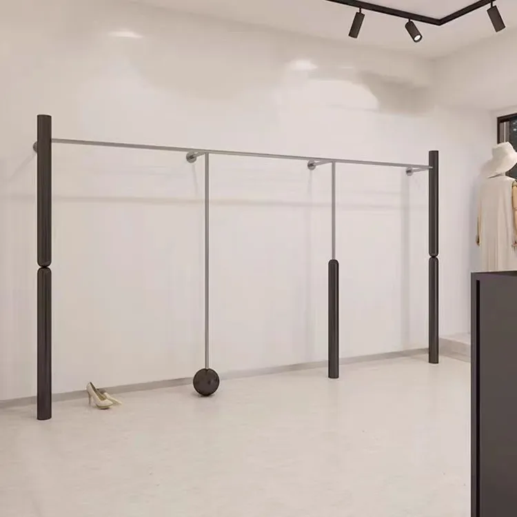 服装店上墙展示架黑色不锈钢陈列架买手店女装挂衣架网红陈列道具