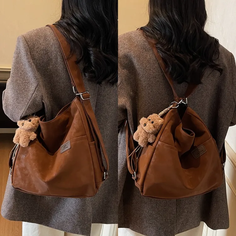 秋冬季高级感手机斜挎小包包女2025新款一包三用斜挎平板ipad背包