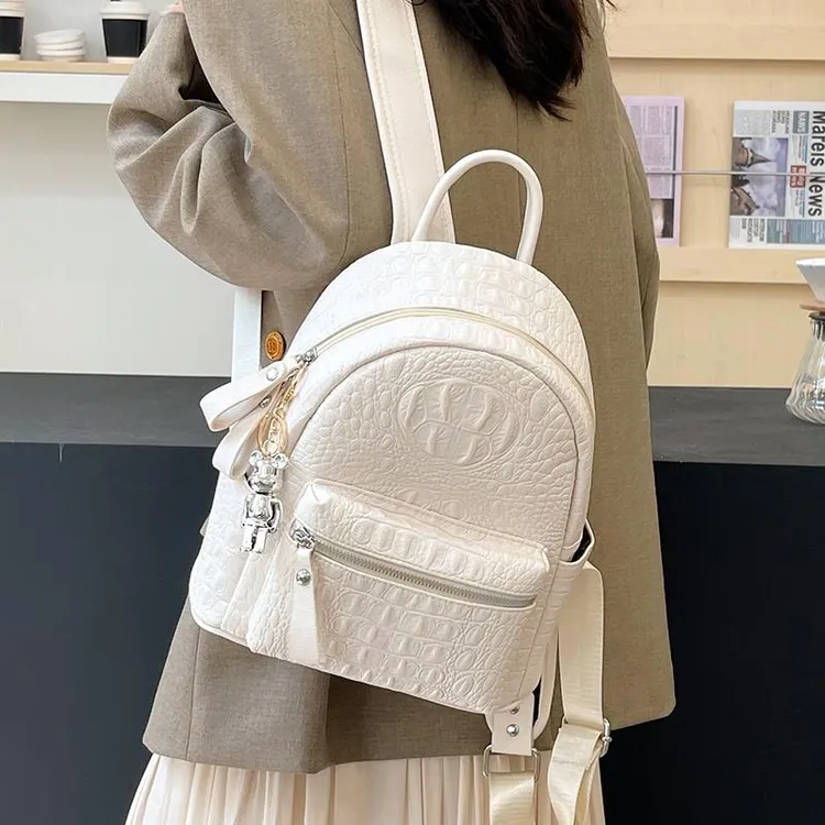 高级感鳄鱼纹双肩背包2025新款潮原创女大学生书包大容量通勤背包