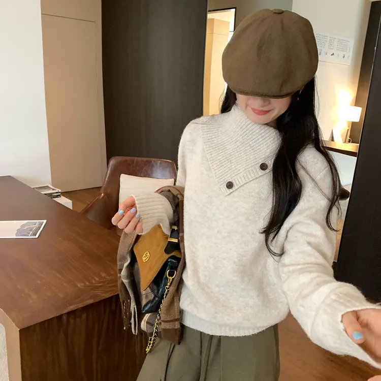 韩系设计感排扣高领长袖针织衫女秋冬2025新款宽松慵懒风套头毛衣