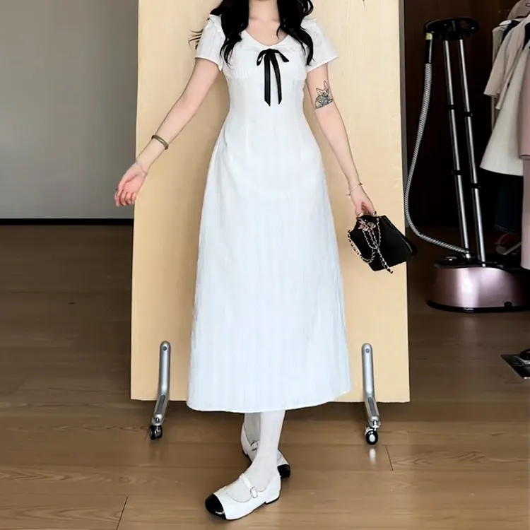 法式温柔白色圆领连衣裙夏季新款设计感蝴蝶结白月光收腰显瘦裙