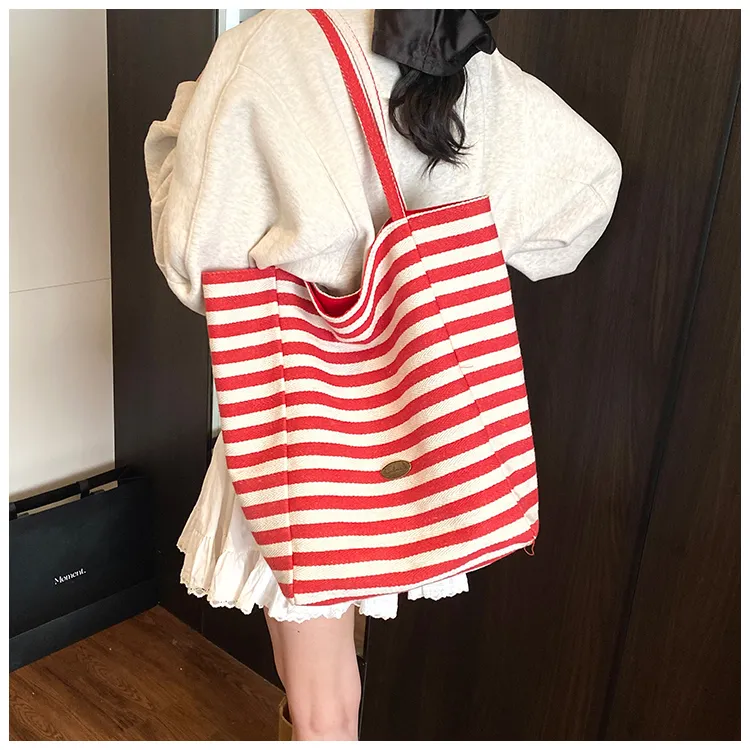 128大容量双面包包条纹气质文艺少女日常通勤百搭单肩腋下包