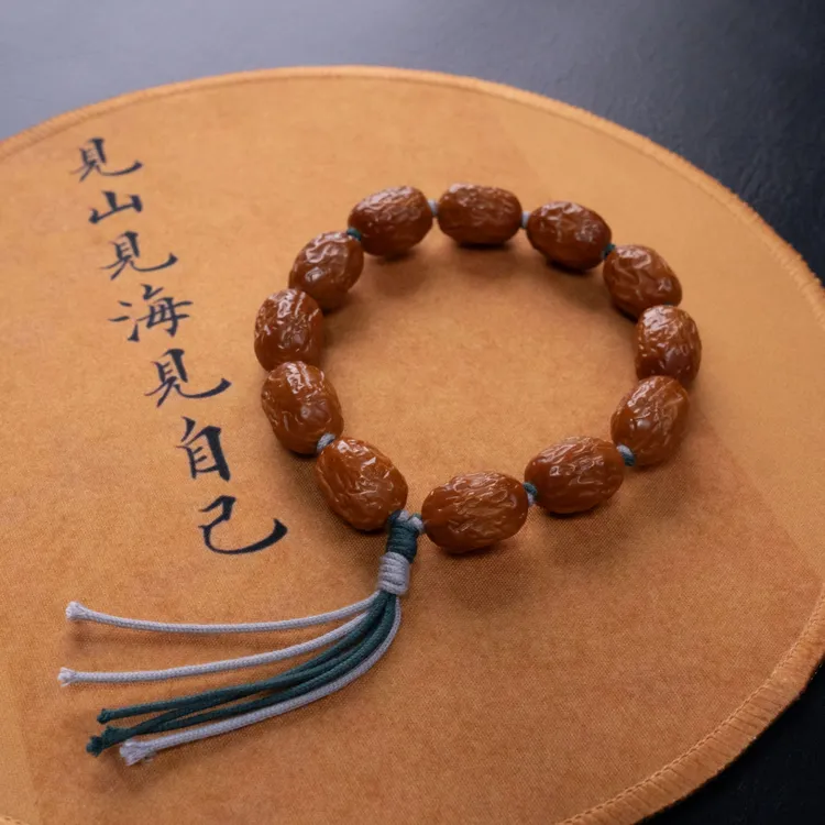 【枣安】原生态老树梅林水晶核手工雕刻精品大枣橄榄核串文玩手串商品图