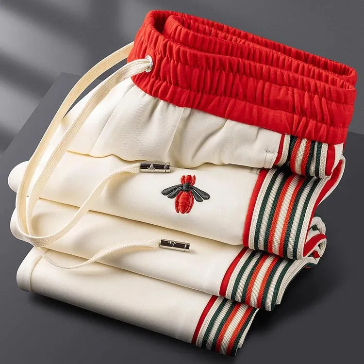 轻奢级秋冬男士商务修身休闲裤欧货高端蜜蜂刺绣直筒小脚高档长裤