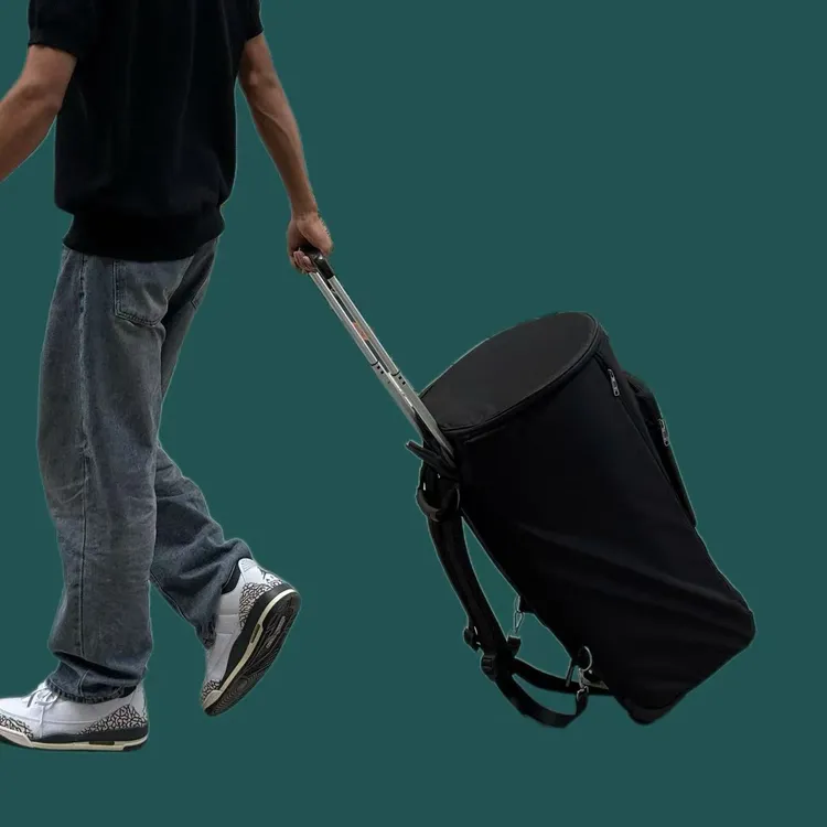 13寸12寸双肩加厚带拉杆的防水鼓鼓包