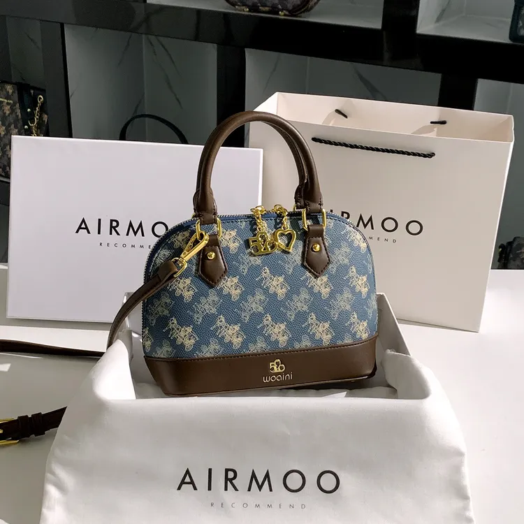 AIRMOO/艾姆轻奢真皮包包女士高级感大容量通勤单肩包贝壳手提包