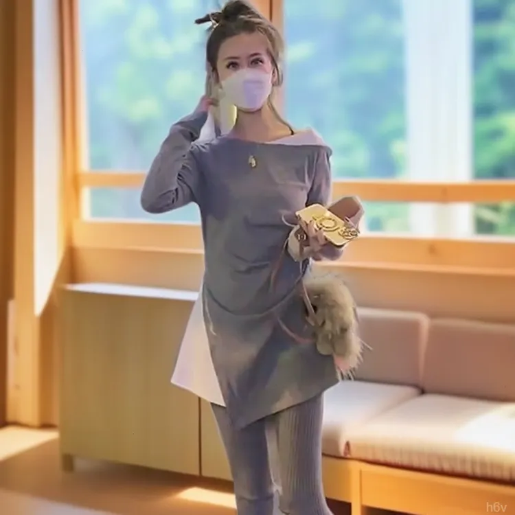 显瘦打春节2025网红时尚潮底新年韩款中长款T恤修身长袖欧货拼接