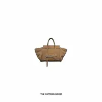 The pattern room | 经典回溯丝光头层牛皮笑脸托特包