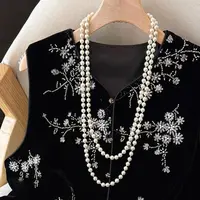 Q4198【特价-占单者限购】美到窒息！烫钻羽毛马甲，显贵有气质8138