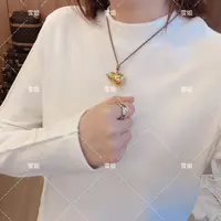 雪姐服饰「纯色捏边立领」秋季显瘦纯色立领长袖简约百搭时尚T恤