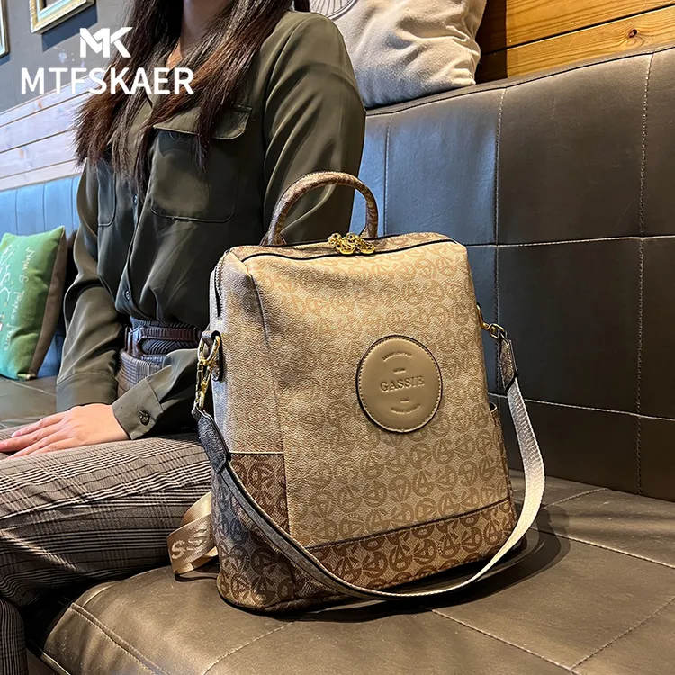 香港MTFSKAER真皮双肩包女2025新款高级感时尚旅行背包大容量书包