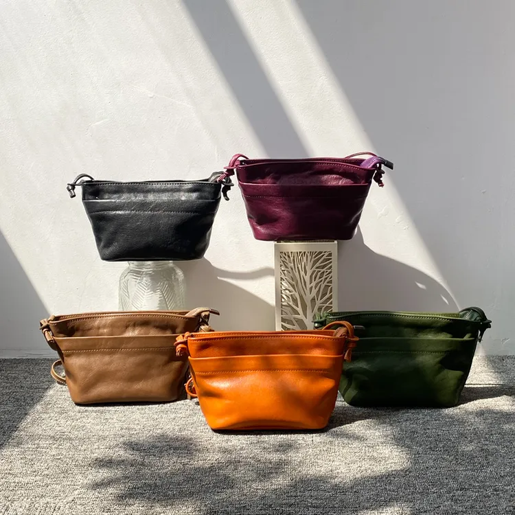 2025高级感女包独立设计斜挎包帆船包头层牛皮包手机专用小包百搭