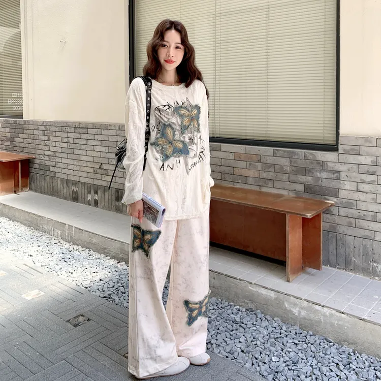 简约设计感套装裤女2025年秋季新款牛仔蝴蝶贴布上衣休闲裤两件套